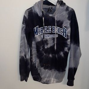 Too big, Does have a bleach stain but has style to it.